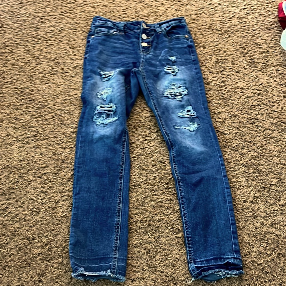 blue ripped jeans